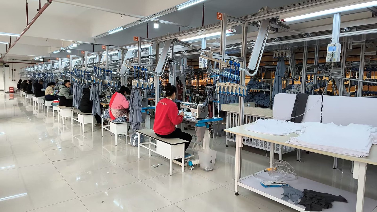 JuHong Sports custom soccer jersey production line in Nanning factory, 2005 founding era