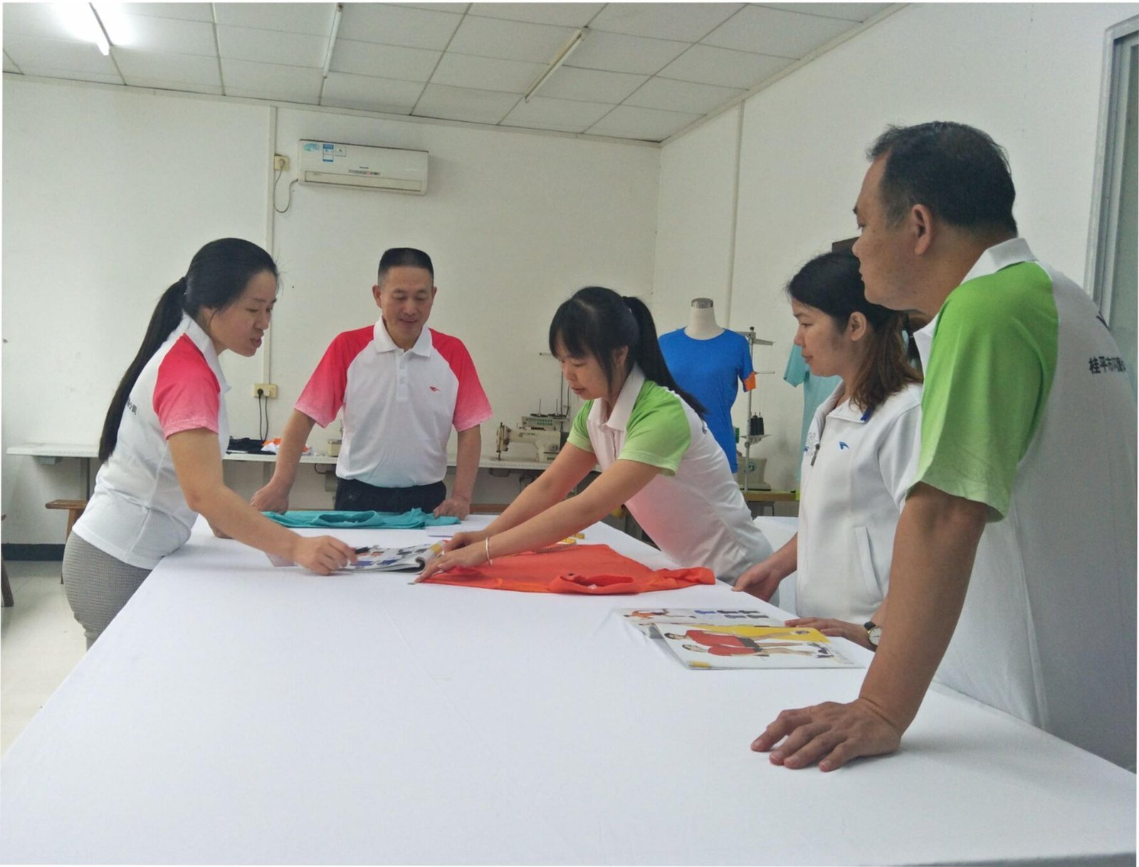 JuHong SPORTS founding team working together in the early days