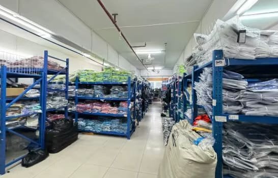 JuHong SPORTS fabric and materials warehouse with over 1 million pieces in stock for fast shipping